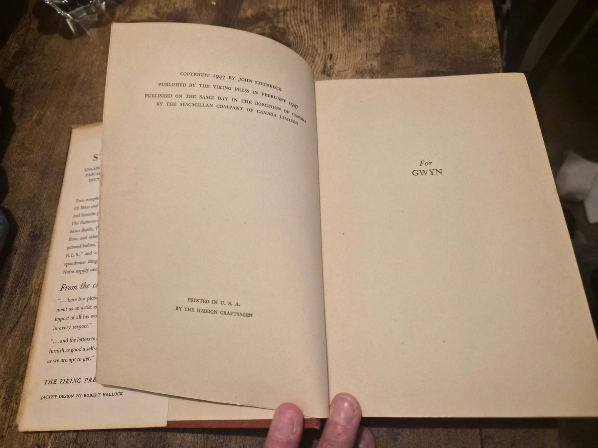 Inside page of The Wayward Bus 1947 first edition by John Steinbeck, featuring copyright notice and dedication.