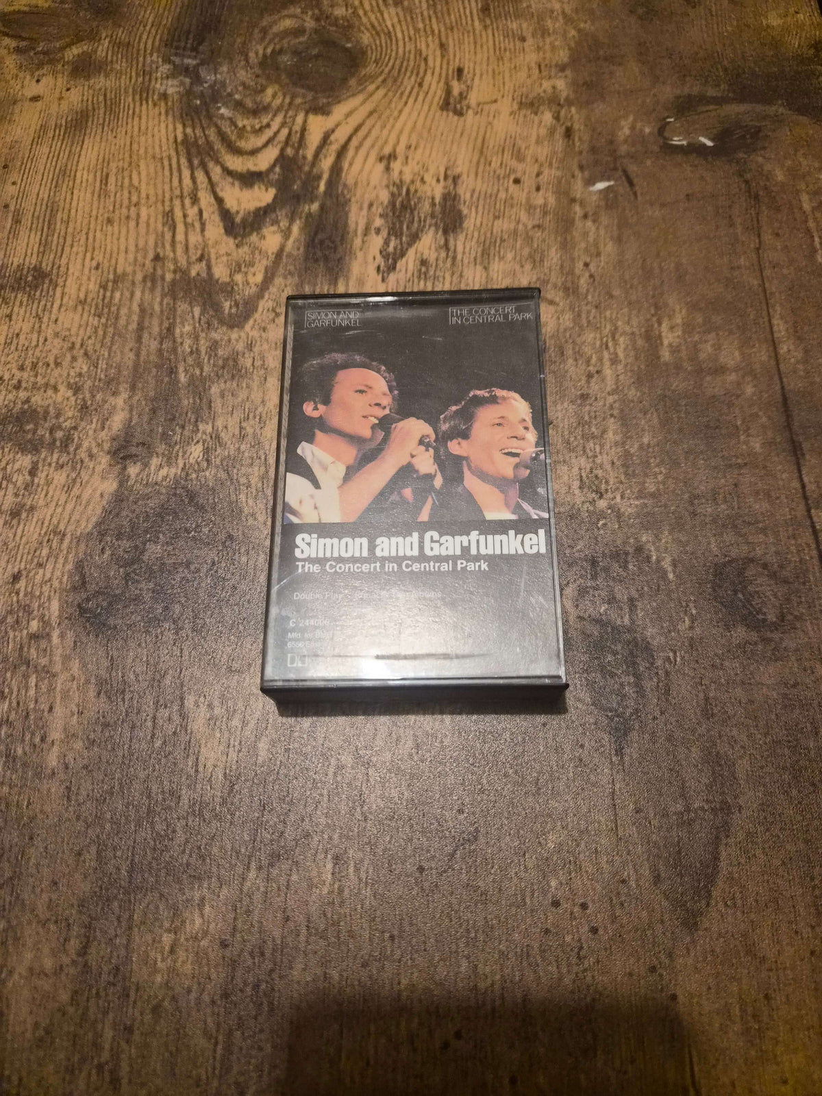 Simon and Garfunkel live concert cassette featuring the iconic duo's performance in Central Park.