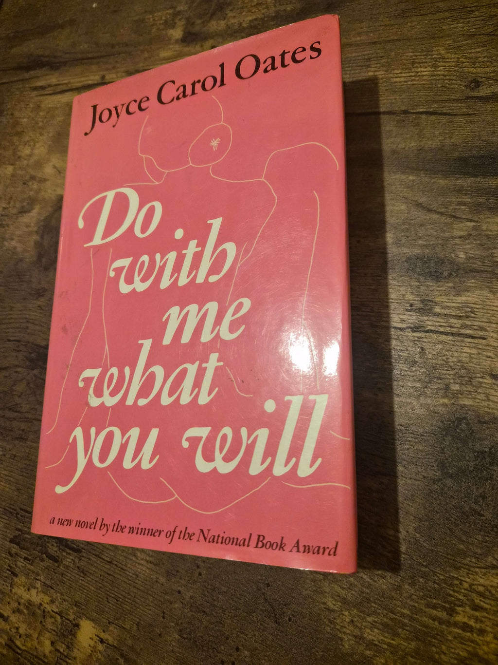 1973 first edition Do With Me What You Will by Joyce Carol Oates, a novel featuring a minimalist design.