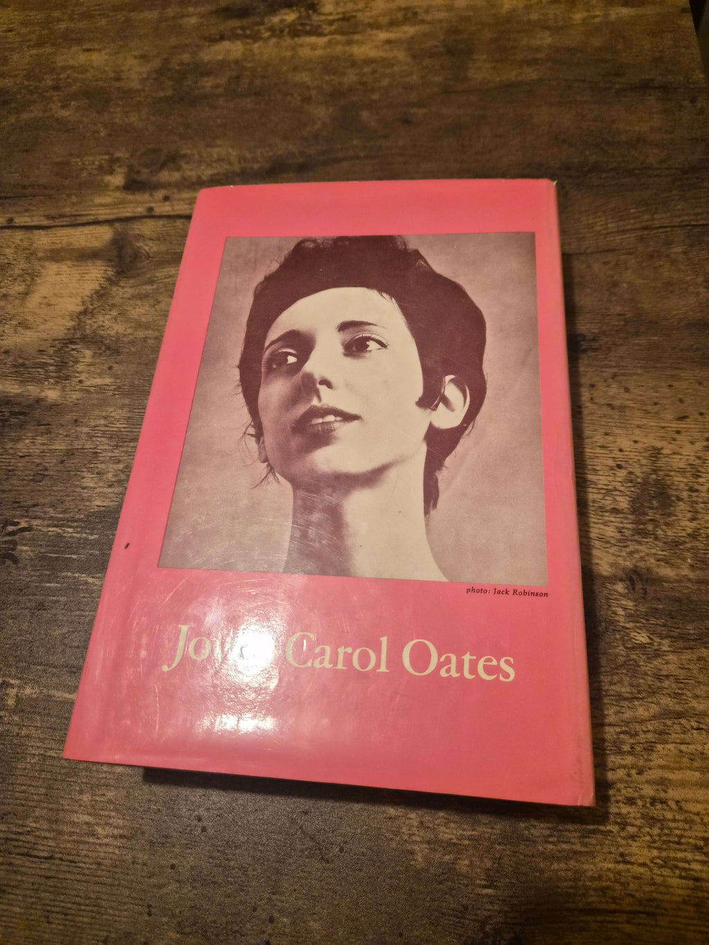1973 first edition Do With Me What You Will by Joyce Carol Oates, featuring a portrait on a pink cover.